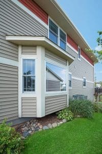 Exterior of home featuring newly installed bay window extending from home's facade. 